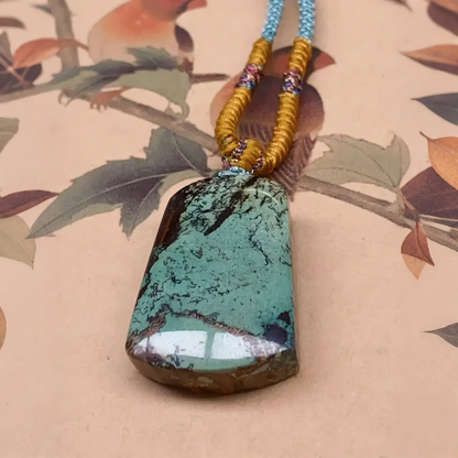 Natural Turquoise Pendant: Peaceful Mountain and Water Scenery