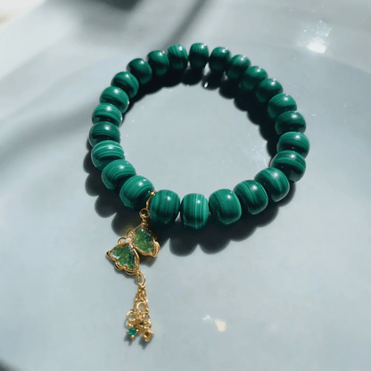 Malachite Bracelet with healing energy, handcrafted with vibrant green stones, symbolizing protection and transformation.